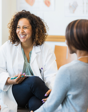 female doctor smiling to patient 