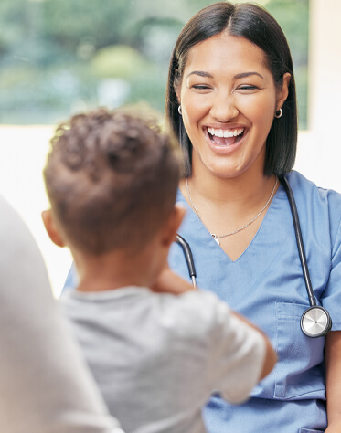female physician smiling at her patient 