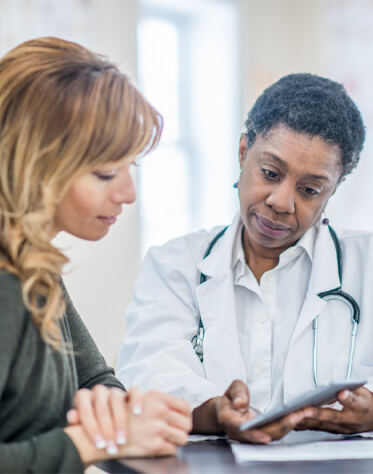 physician talking to her patient
